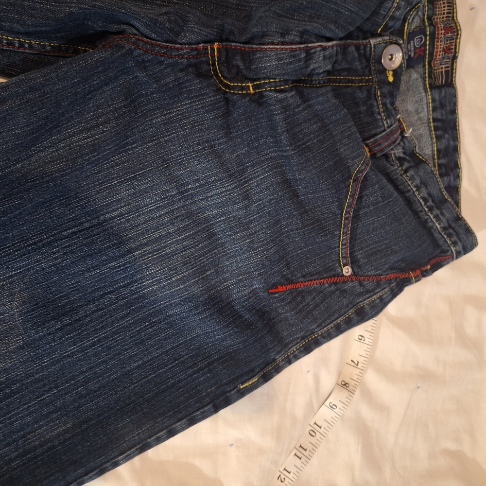 Stylish Blue and Red Jean Shorts with Unique Texture